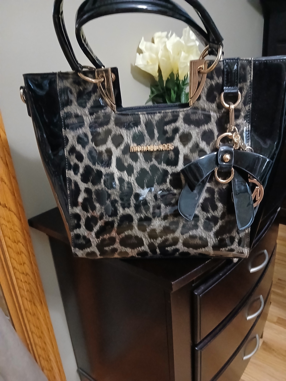 MICHAEL KORS Black and Beige Leopard Patent Leather Tote with Bow Charm